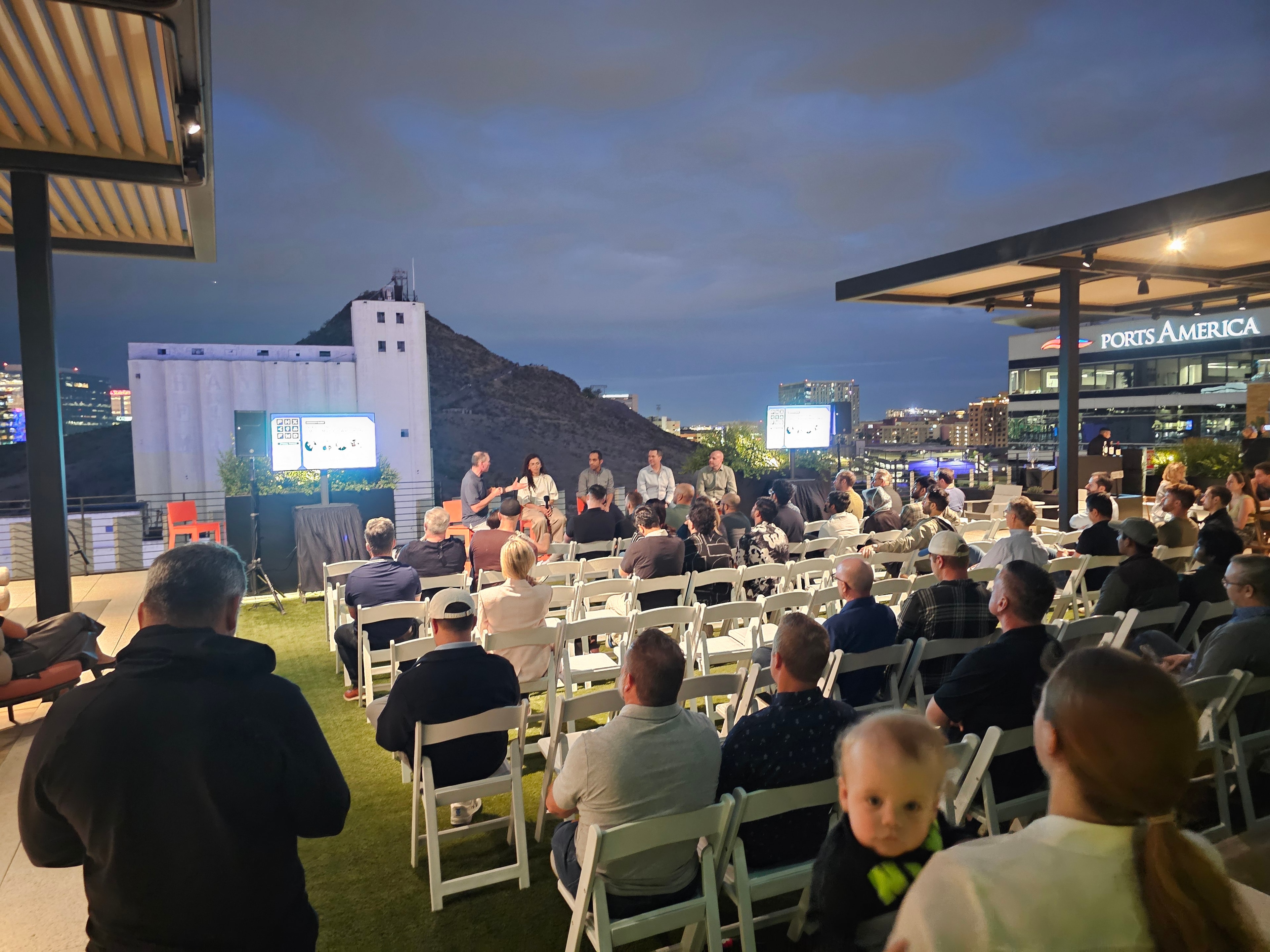 Outdoor rooftop event with live music performance