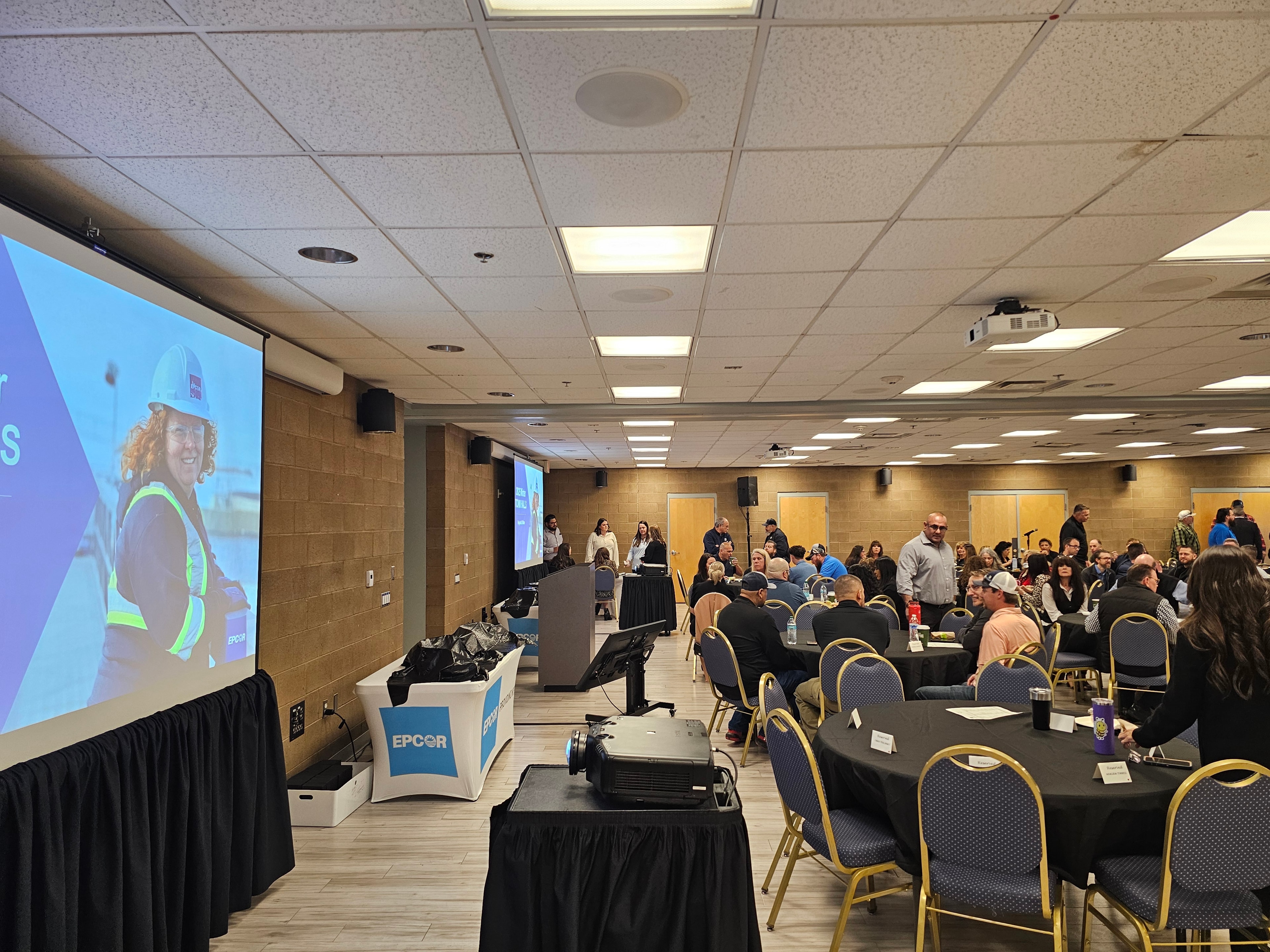 Conference room presentation with seated audience
