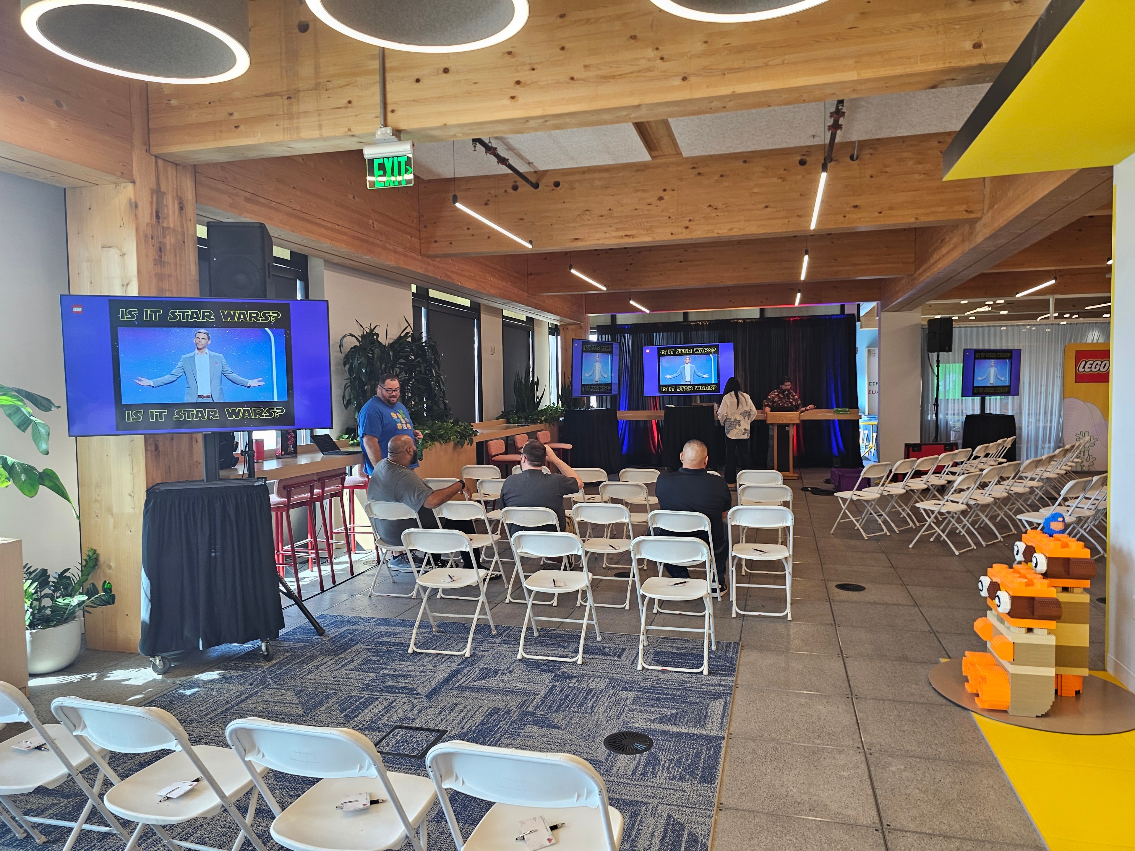 Event space with Star Wars themed presentation screen