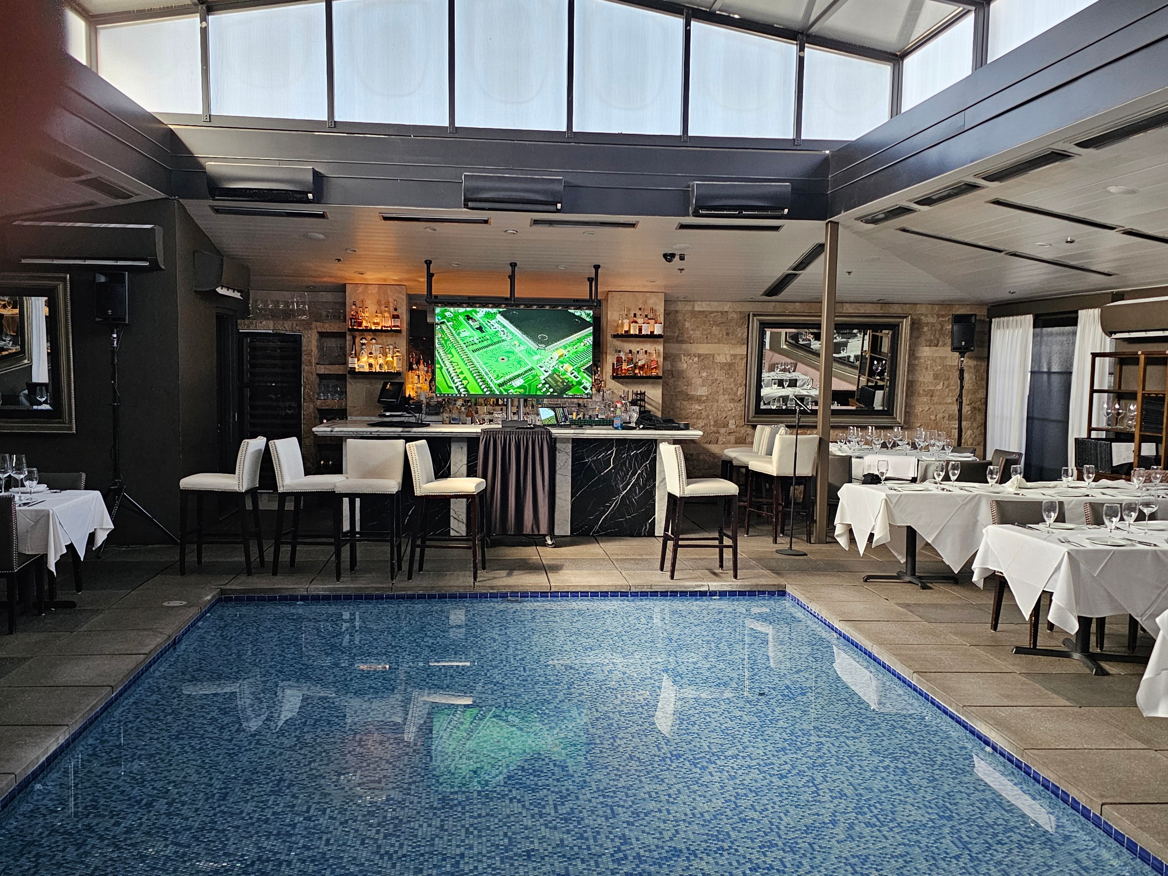 Indoor pool bar and restaurant lounge area