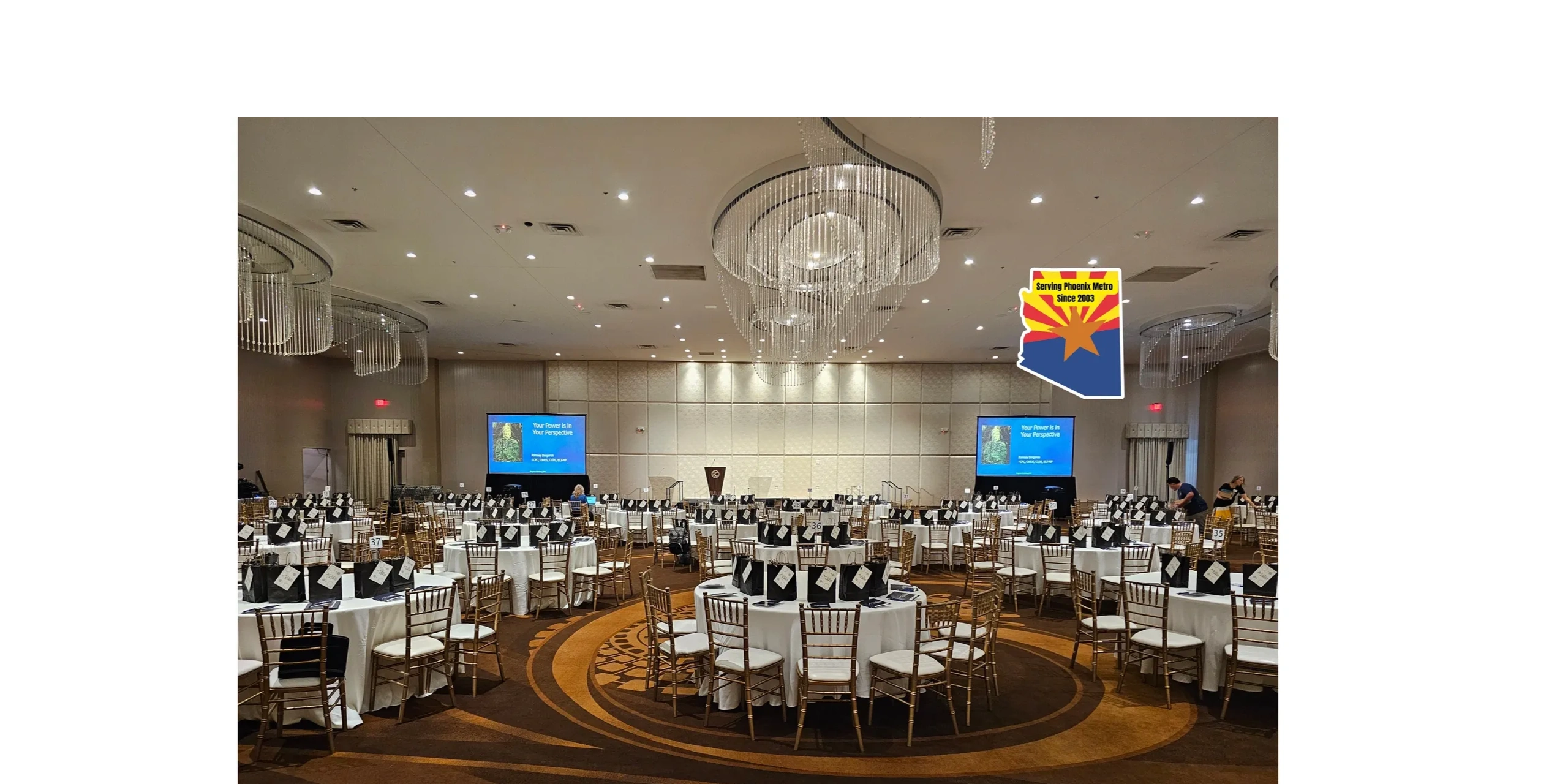 Corporate ballroom event with blue displays
