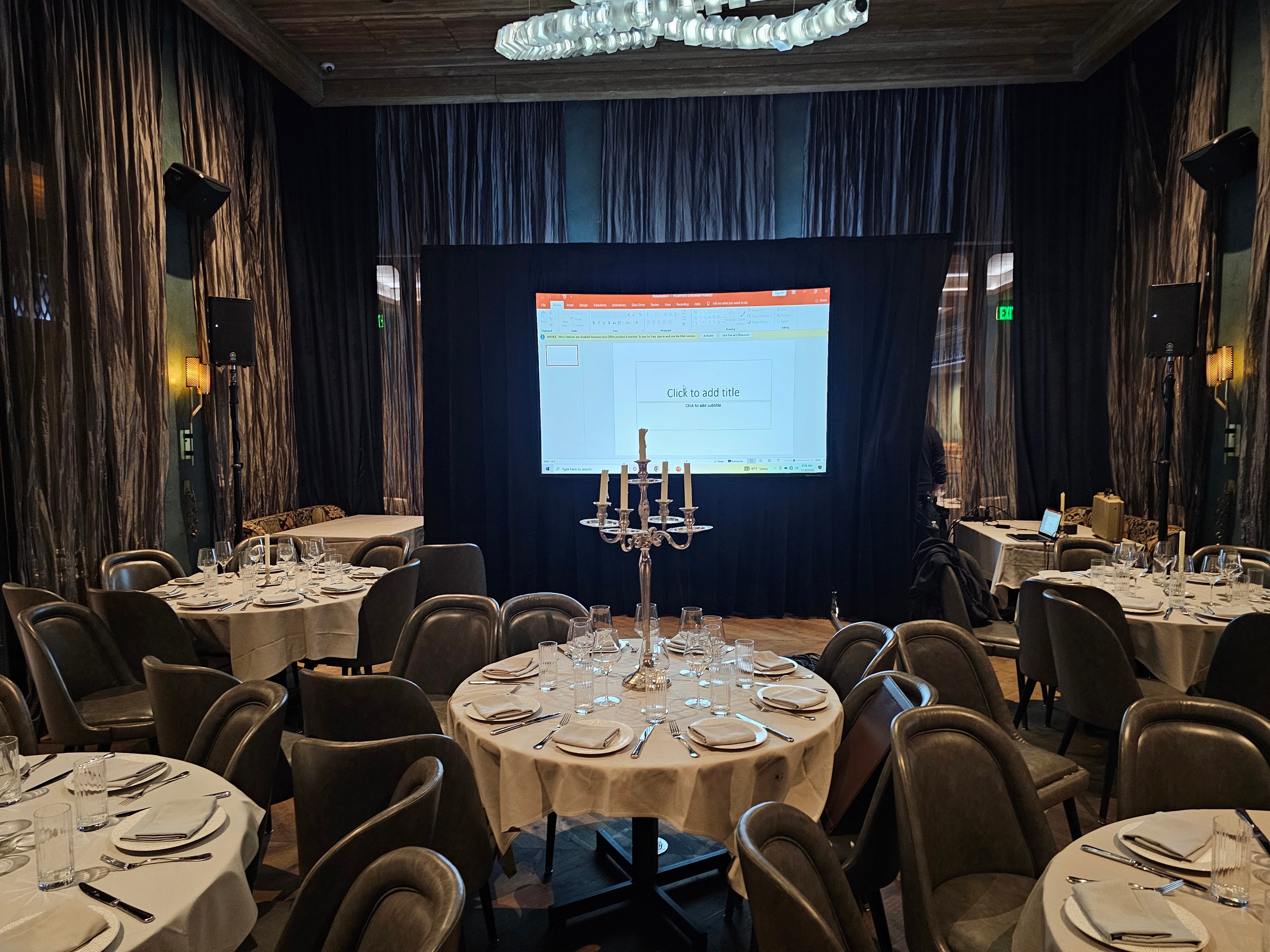 Elegant banquet hall with projection screen