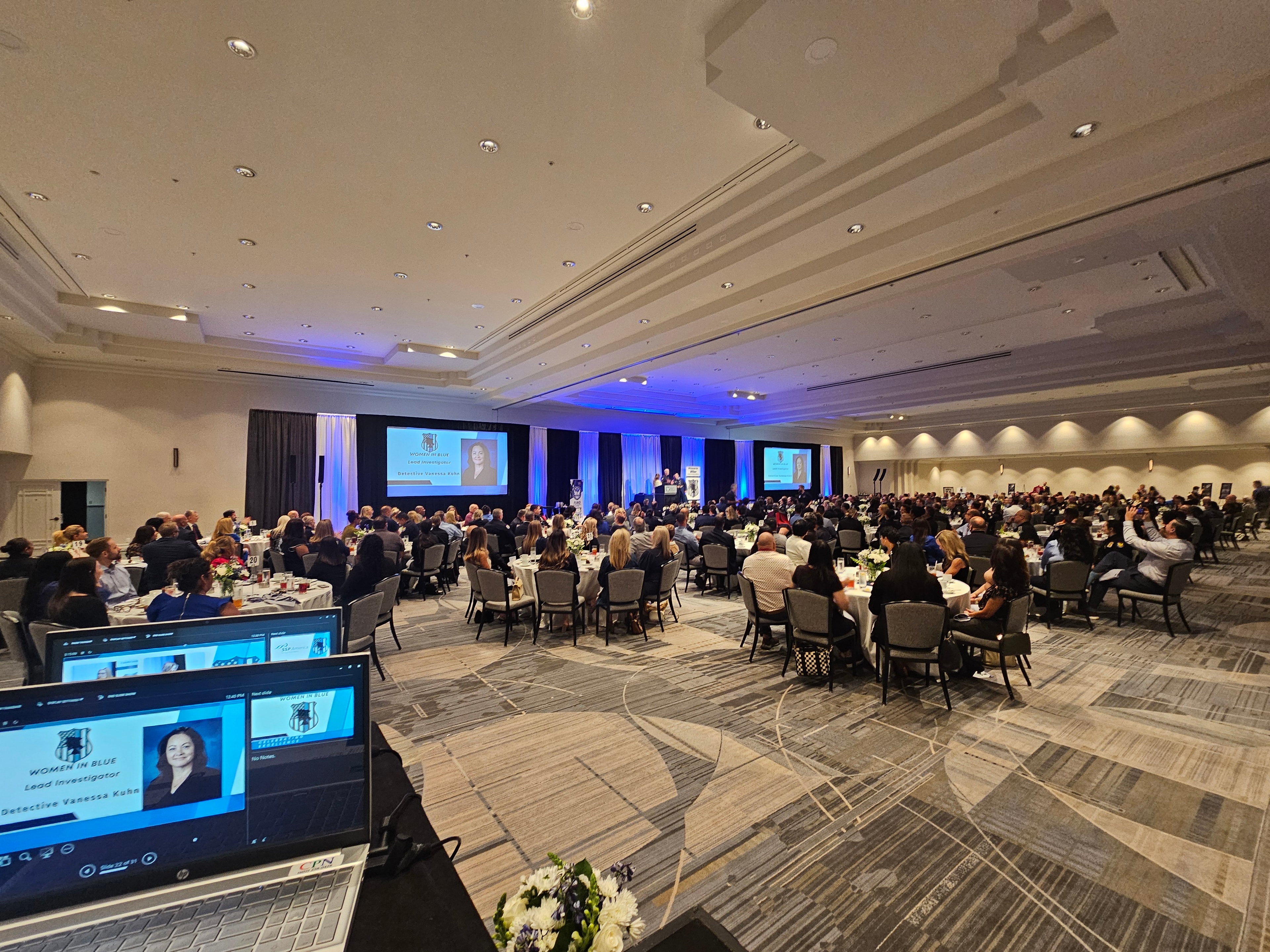 Large conference ballroom with seated attendees