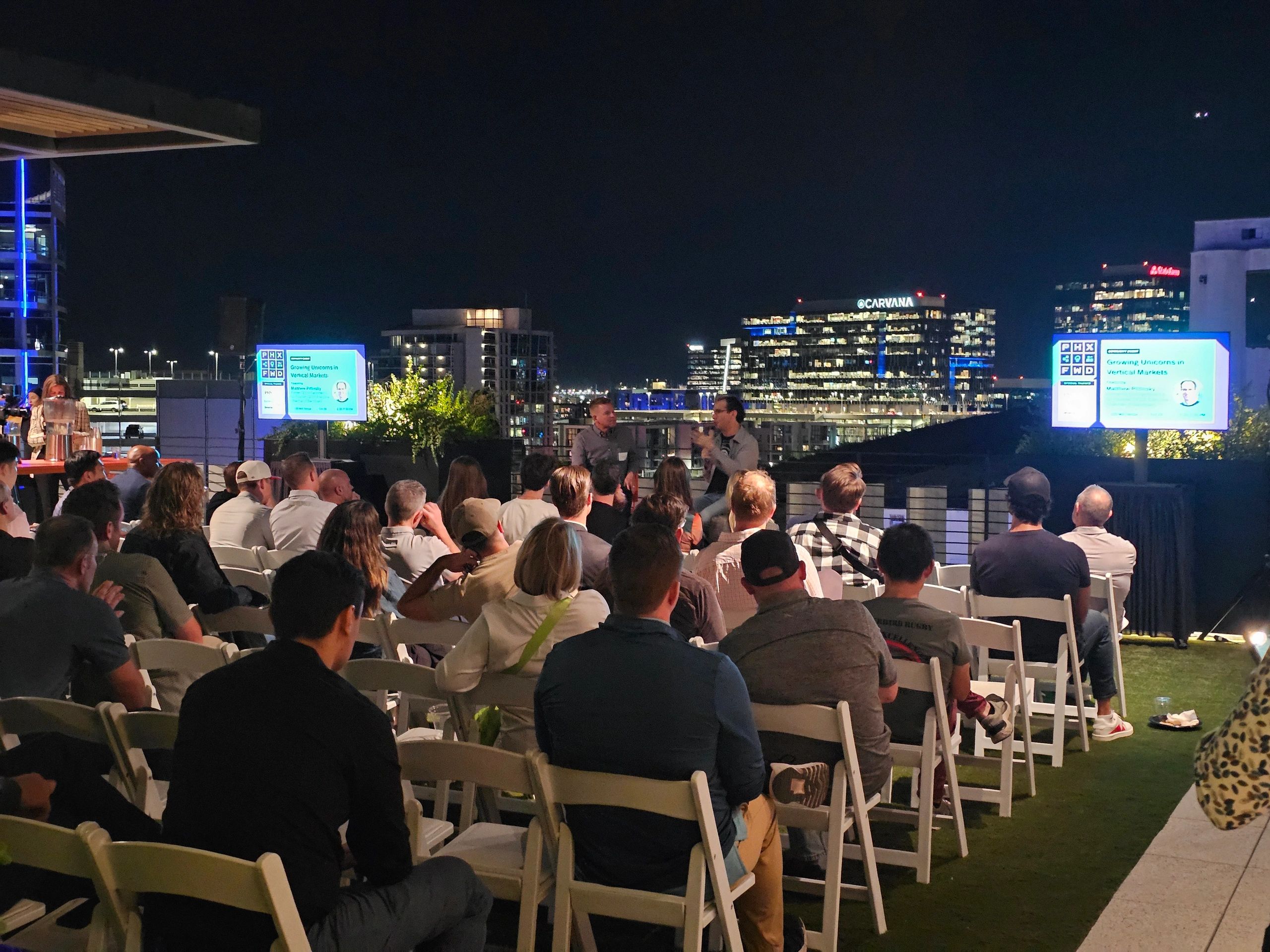 Rooftop outdoor event with city skyline